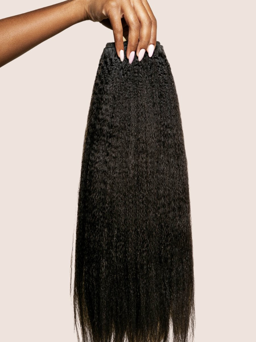 Coarse Kinky Straight weft held to show texture details