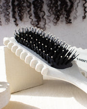 White bounce curl hair brush for natural hair with vented sides for curl clumping