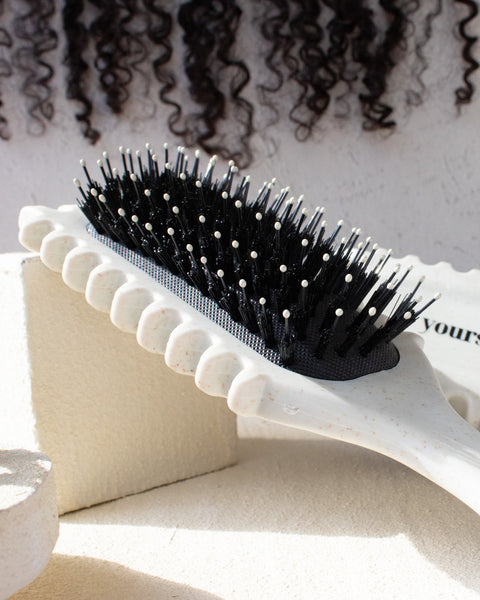 White bounce curl hair brush for natural hair with vented sides for curl clumping