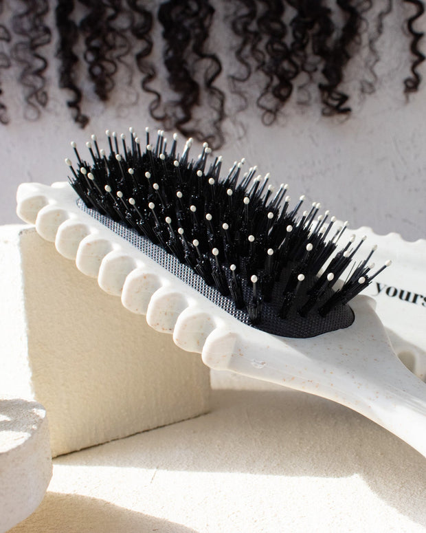 White bounce curl hair brush for natural hair with vented sides for curl clumping