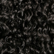 Detail of spiral curl hair texture; type 3b/c hair texture 