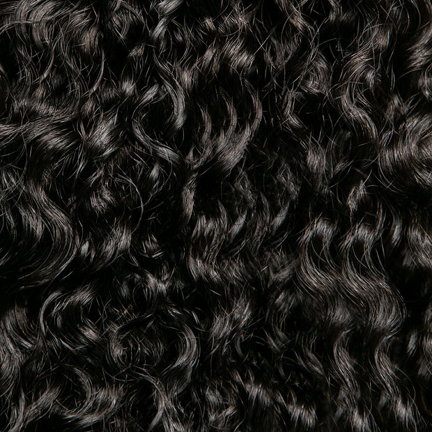 Detail of spiral curl hair texture; type 3b/c hair texture 